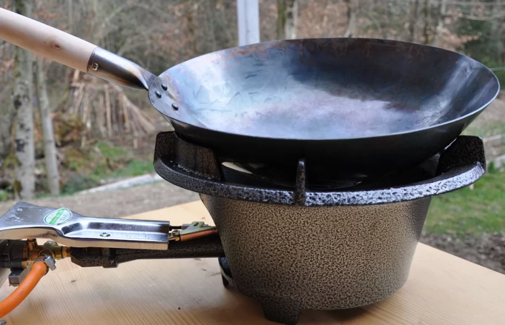 propane wok burner with 14 inch round bottom seasoned carbon steel wok